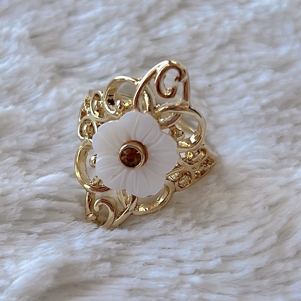 Gold Tone Ornate Ring with a White Flower